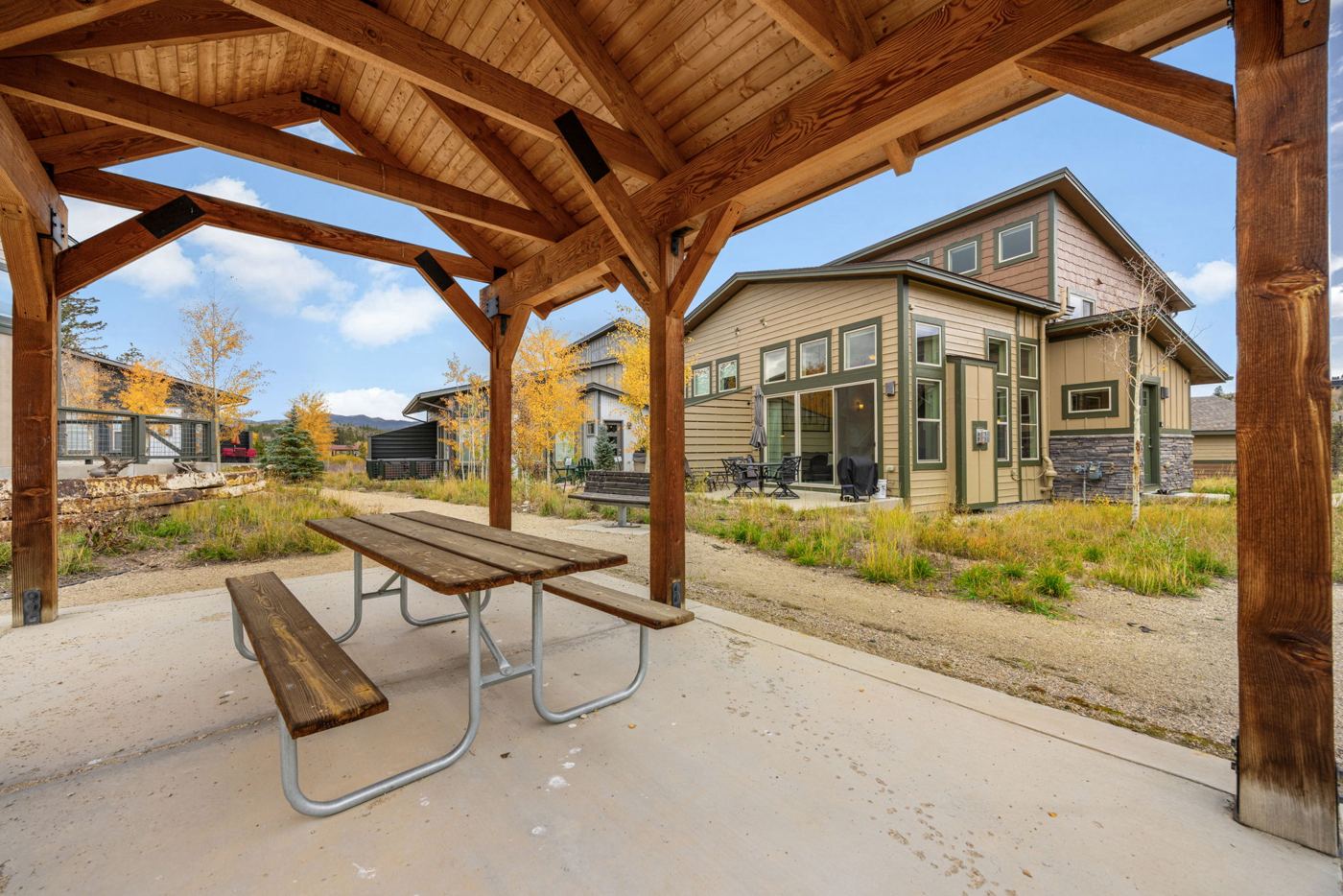 Timber pavilion and patio outside the townhome